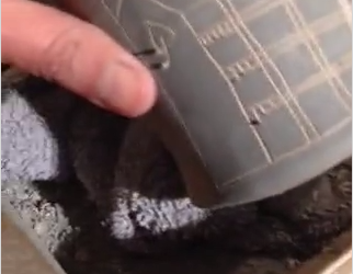 Maria Guevara decorating mugs